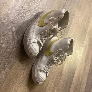 Nike Women’s White Leather Sneakers with Yellow Swoosh